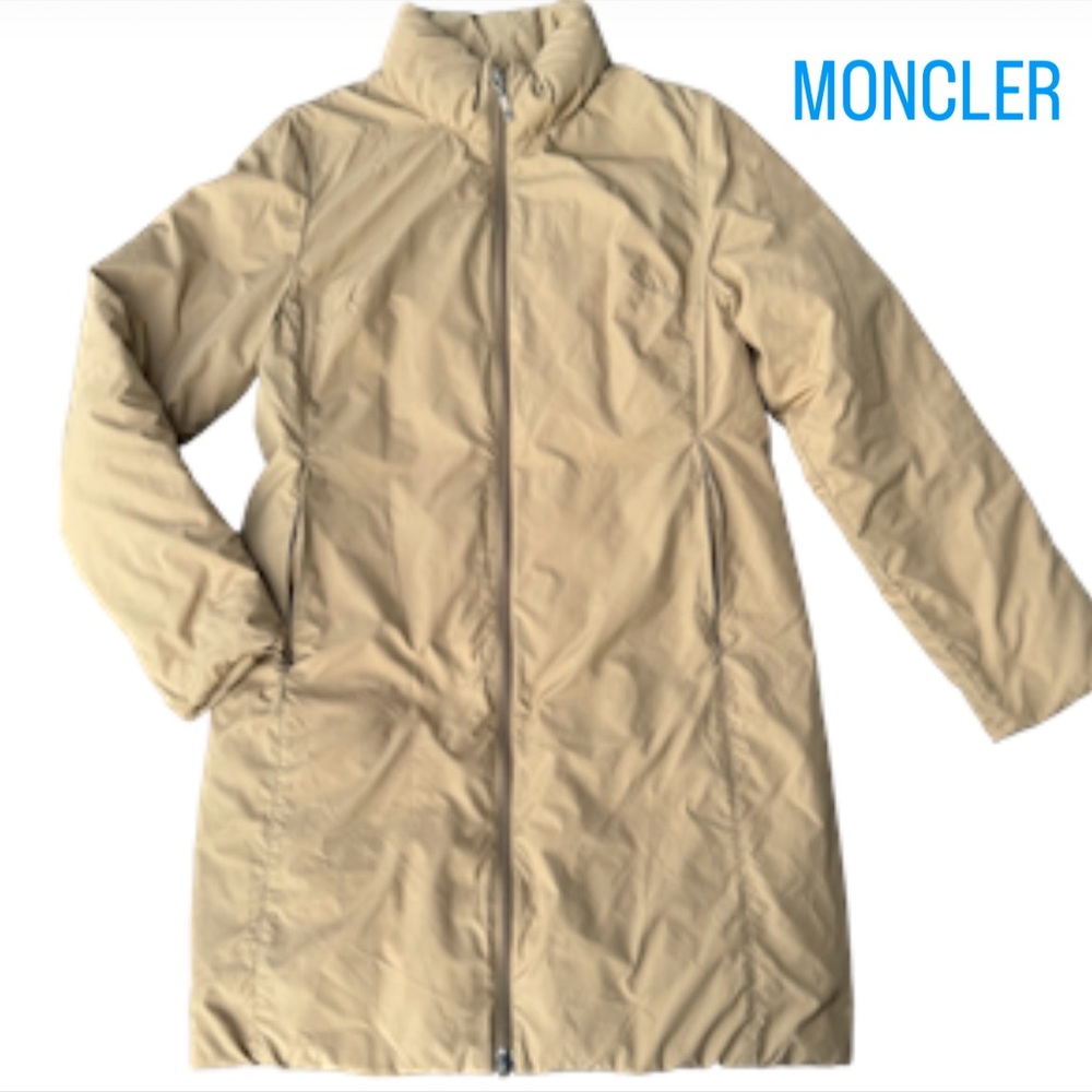 MONCLER  Minimalist sleek puffer coat.